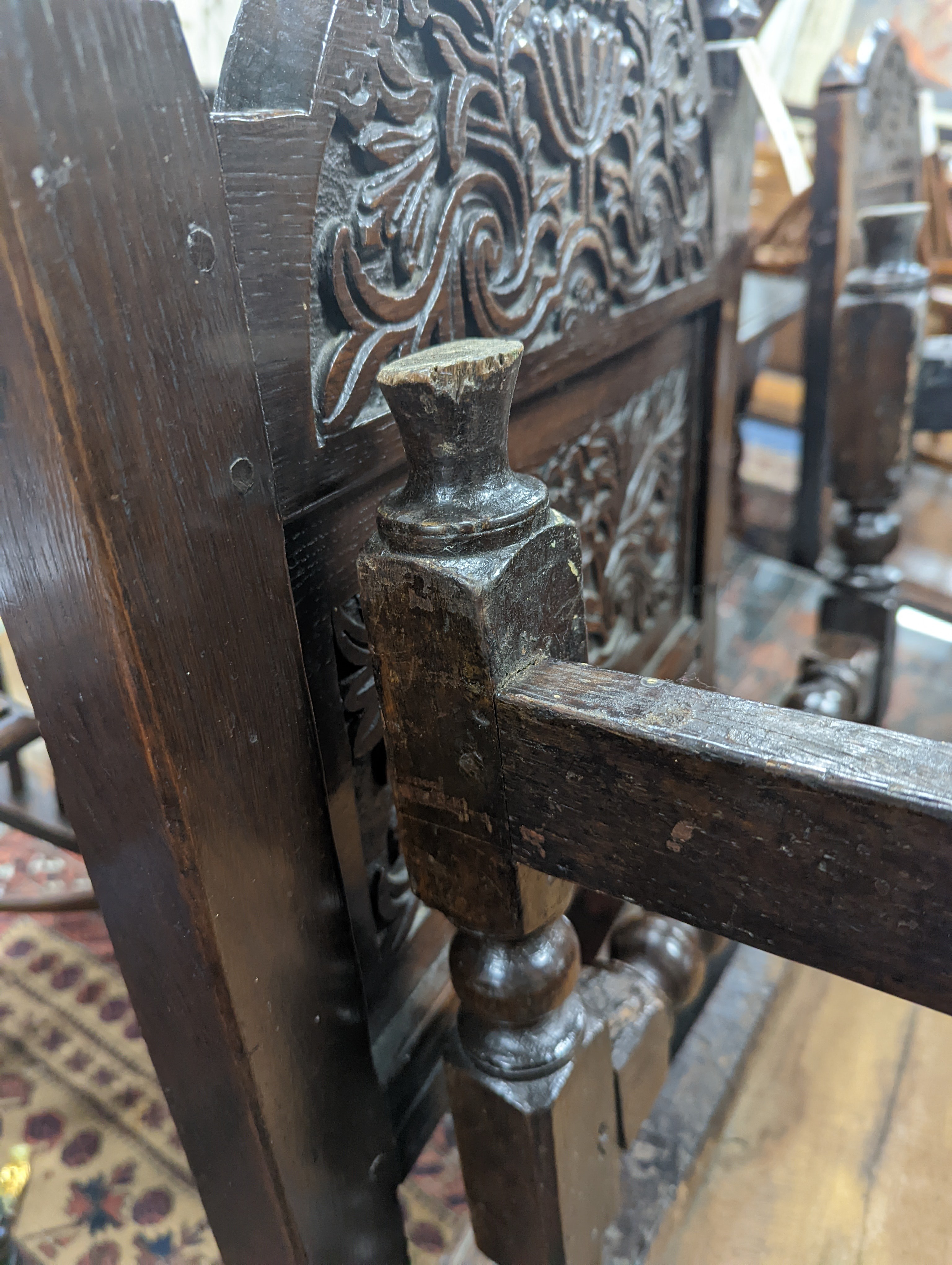 A pair of 17th century Lancashire carved oak side chairs, width 45cm, depth 39cm, height 101cm